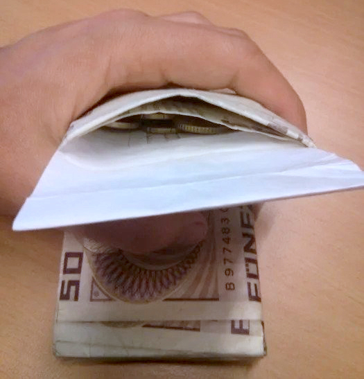 coin pocket DIY on mighty wallet end flap using packaging tyvek.jpeg